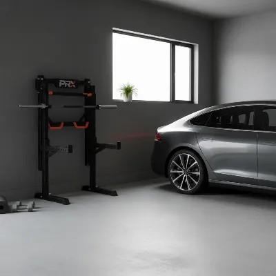 PRx Profile PRO Squat Rack folded flat against a garage wall, showcasing its space-saving design in a home gym setting.
